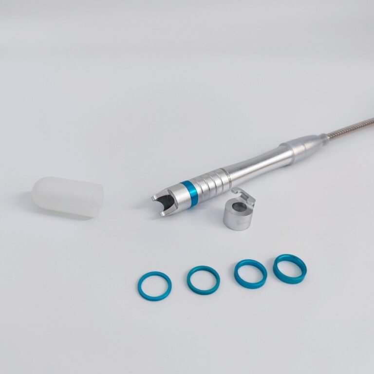 The 980nm vascular handpiece supplied with the DPL4, shown with its protective cap and four focus rings