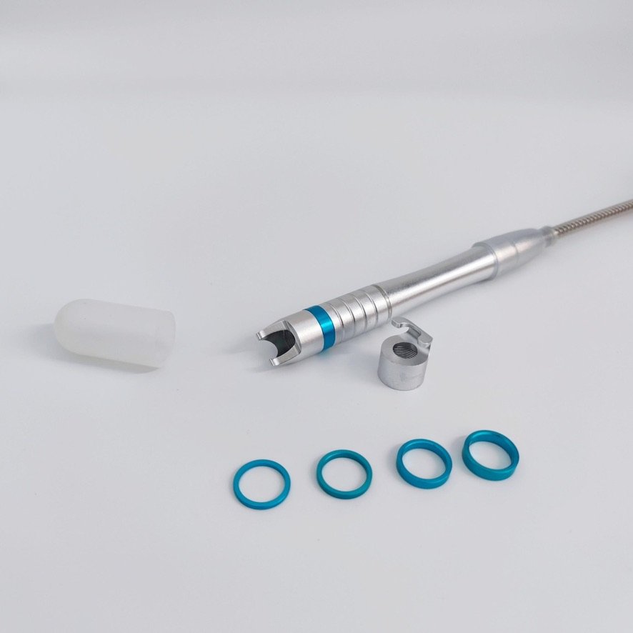 The 980nm vascular handpiece supplied with the DPL4, shown with its protective cap and focus rings