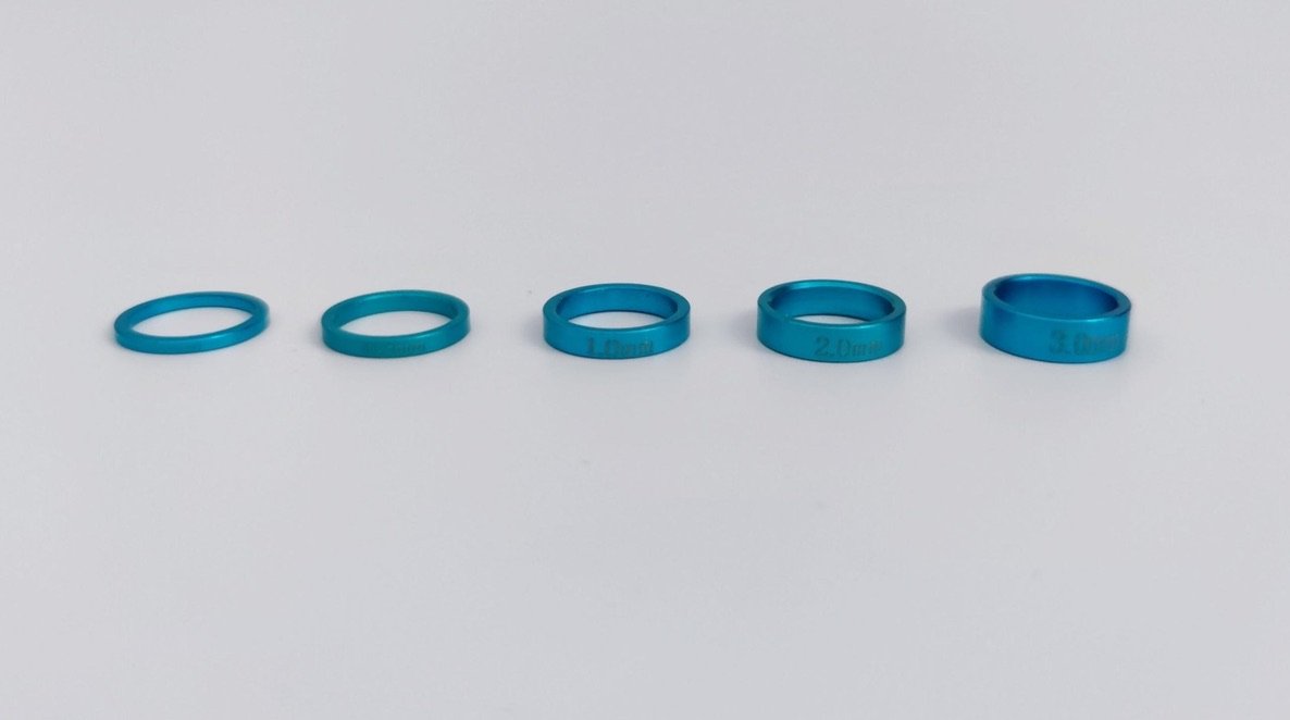 The five 980nm focus rings that set the spot size, from 0.2mm through to 3mm