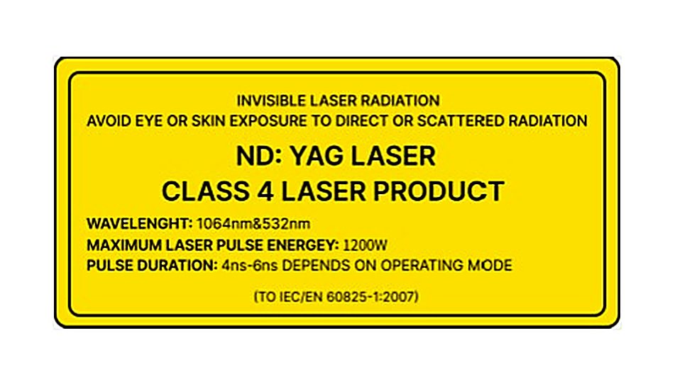 A Class 4 laser explanatory warning label in black on yellow showing wavelength, maximum pulse energy and pulse duration