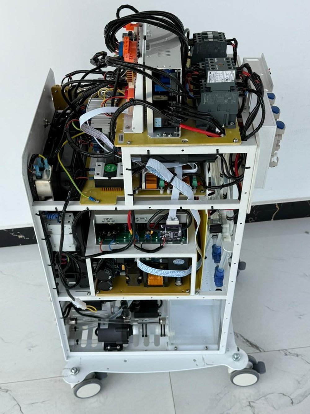 The DPL4 with its side panel removed, showing the internal boards, wiring and components