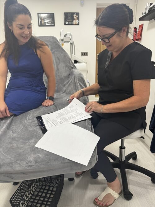 Students wearing laser safety eyewear during training at Skintastic Aesthetics