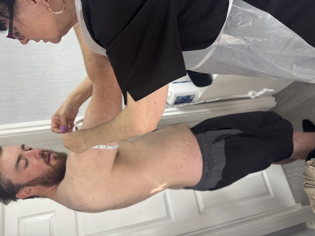 Level 4 ultrasound cavitation training student practising on a model's abdomen