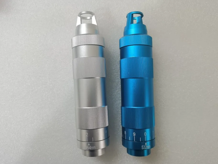 Adjustable spot size Nd:YAG laser zoom handle tip, 1064nm and 532nm